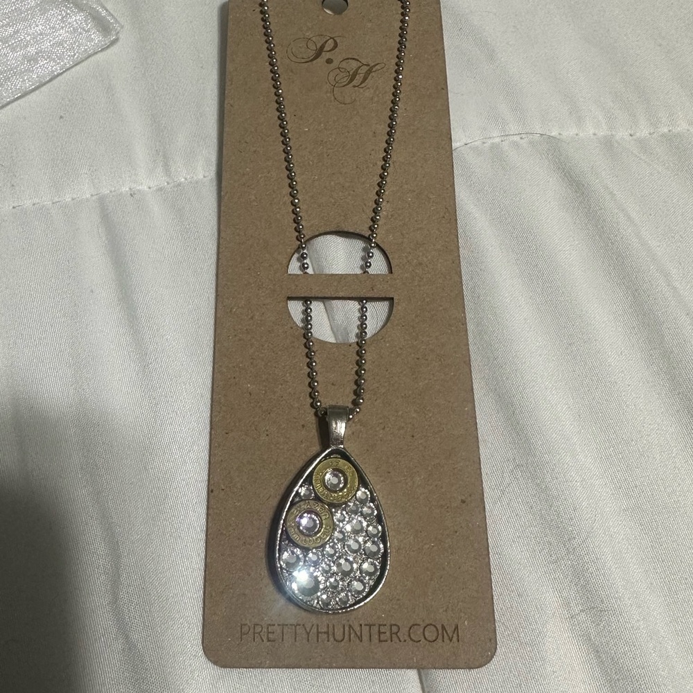 Gold and Silver Pendant Necklace NWT pretty hunter bullet